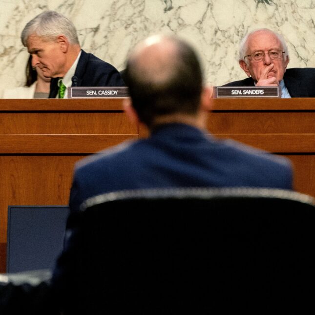 Senator Bernie Sanders (right) looks straight ahead as Senator Bill Cassidy looks off to the left. -- health policy coverage from STAT