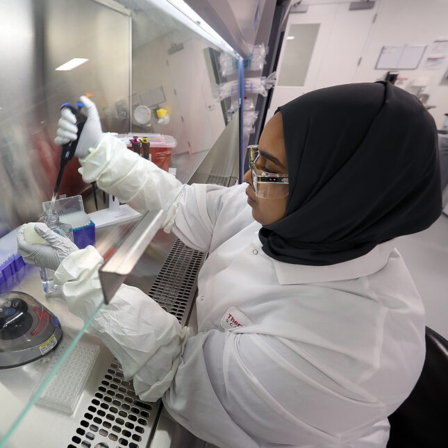 Scientist Nour Tabidi prepares a DNA sample in a lab. -- health coverage from STAT